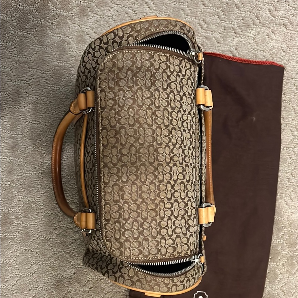 Coach LIMITED EDITION 
Brown and Tan Duffel Bag with Sophisticated Design - Picture 8 of 8